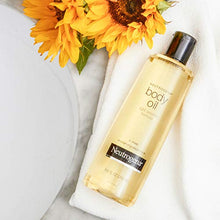 Load image into Gallery viewer, Neutrogena Fragrance-Free Lightweight Body Oil for Dry Skin, Sheer Moisturizer in Light Sesame Formula, 8.5 Fl Oz
